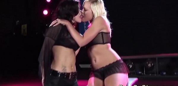  rough lesbian dildo lesson on public show stage